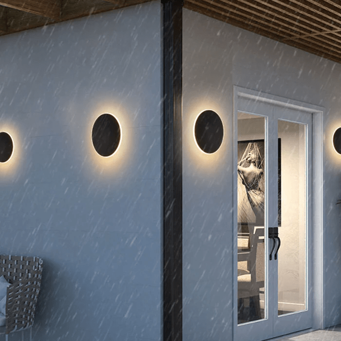 Minimalistyczna okrągła lampa LED ścienna z metalu do użytku zewnętrznego